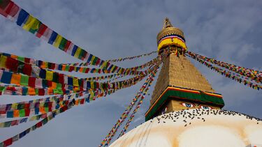 Nepal landmark with flags