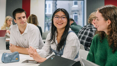 Students sat in a seminar room.