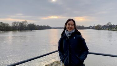 A woman stood in front of a river