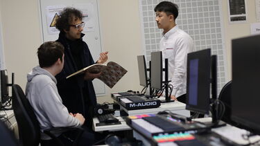 Teaching class in music studio