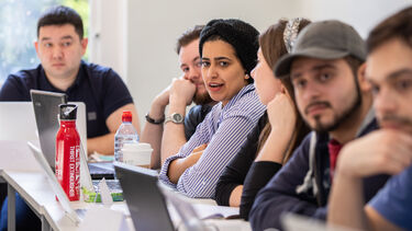 postgraduate students in seminar