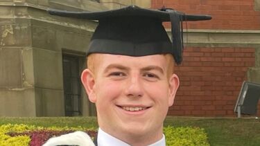 Photo of Robert Sykes at graduation