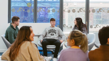 Students socialising in the cafe.