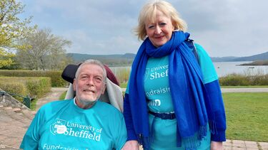 Tim Shone and Dame Professor Pam Shaw smiling at the camera