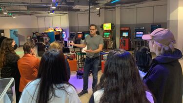 Masterclass talking in video studio to students 