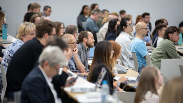 People sitting in a lecture theatre