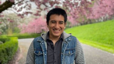 Hernan Ibarra, smiling in a park