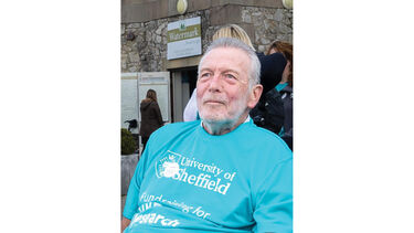 Tim wearing his MND shirt 