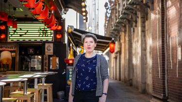 paulien cornelisse standing next to a japanese open air restaurant 