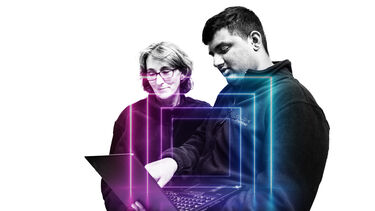 Productive Machines team looking at a screen