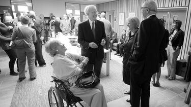 People chatting at a Sitran public event