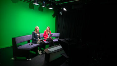 two girls in a TV studio 