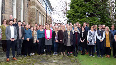 all staff photo outside elmfield