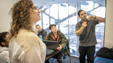 A group of students giving a presentation
