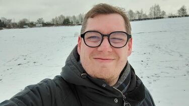 A selfie of Luke taken outside in the snow
