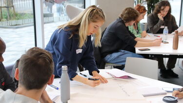 A group of students taking part in a challenge