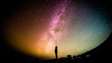 Person looking up at the night sky/universe