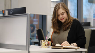 Mature student working independently 