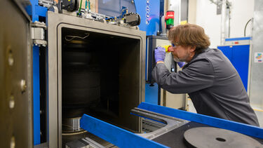 Nigel Adams loads the FAST with a mould filled with titanium swarf