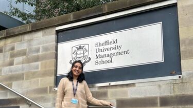 Kanak Soni stood outside the Management School