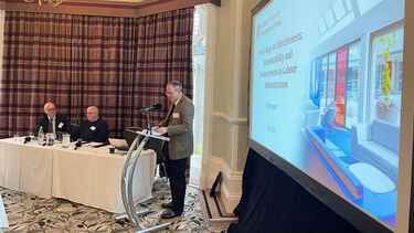 Jason Heyes delivers a presentation at the CDW/ILO Workshop