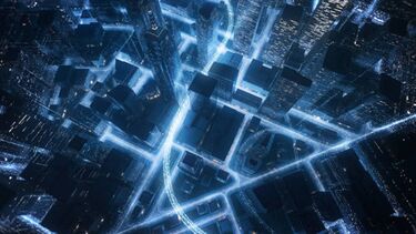 A birds eye view of a city at night.