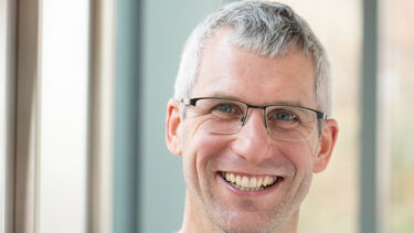 Man standing for photo