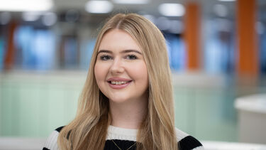 Sheffield student, Caitlin, smiling at the camera.