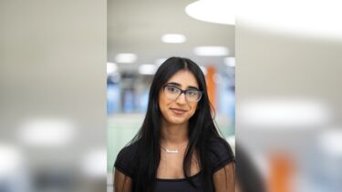 Sheffield student, Amaarah, smiling at the camera.