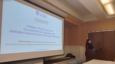 Valeria Insarauto presents research paper to IRLE members