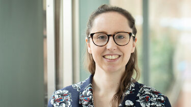 Woman standing for headshot