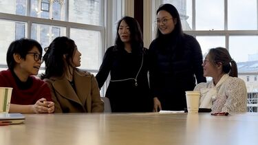 Picture of 5 Korean language instructors in a meeting