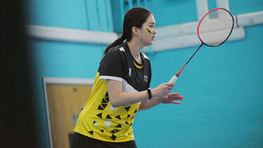 Anett playing badminton.