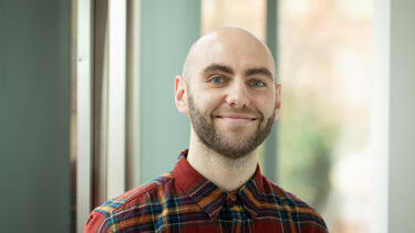 Man standing for photo