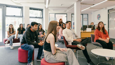 Students listening to a talk in the Employability Hub.