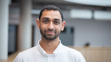 Headshot photograph of Mohammed Khan