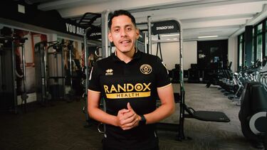 Carlo in a gymnasium introducing his day in a life video