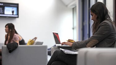 Women checking laptop