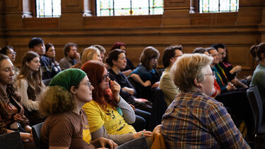 An audience sat on chairs