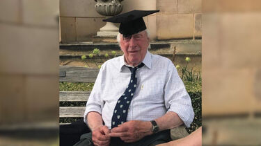 Sheffield alum, Brian Wildsmith, wearing a cap and looking fondly at the camera. 