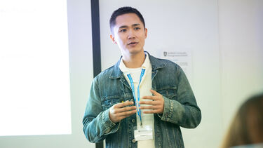 Songhui Li presenting.
