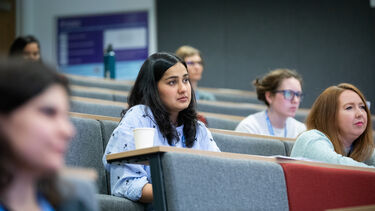 PhDs sat in a lecture.