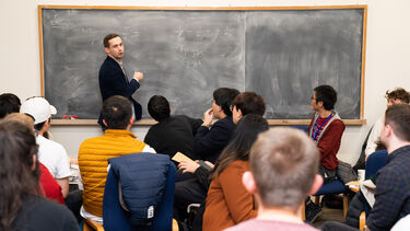 Maths professor taking a lecture