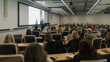 A presentation being given to a full room at the ECREA conference