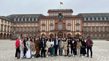 The full MBA cohort outside Mannheim Business School