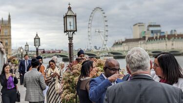 Alumni enjoying the terrace at the House of Lords