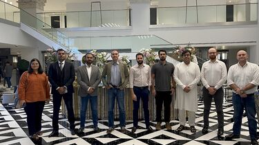 Management school staff and alumni group in hotel in Lahore, Pakistan