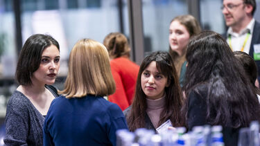 Sheffield students and graduates in deep conversation. 