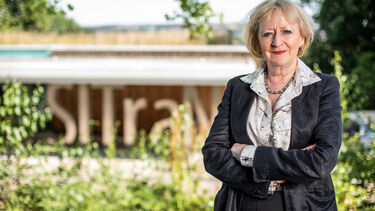Professor Dame Pamela Shaw in front of the SITraN building