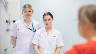 Two student nurses in uniform